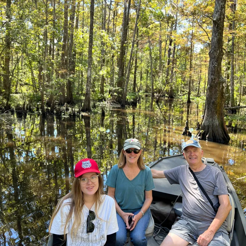 a group of people in a forest